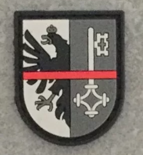 Badge GE "The Thin Red Line Switzerland"