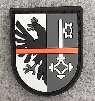 Badge GE "The Thin Orange Line Switzerland"
